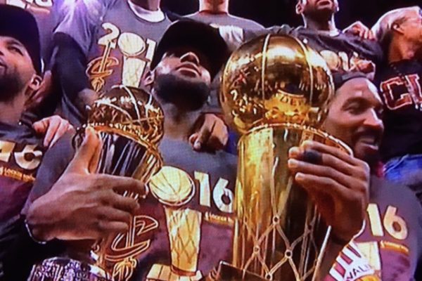 LeBron Holding Both NBA Championship and MVP Trophies